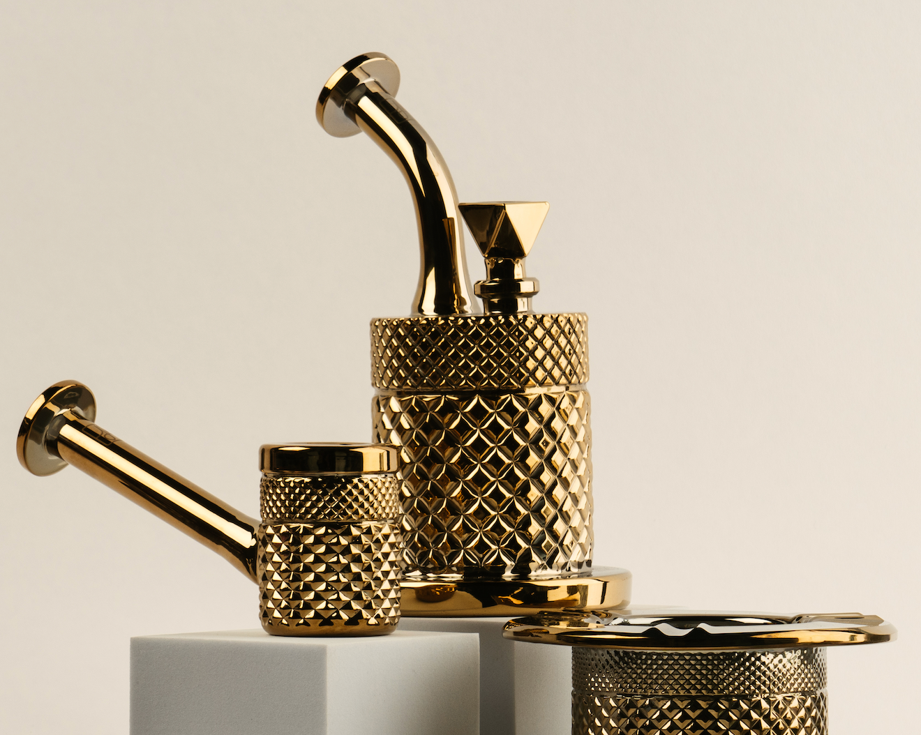 Jane West Twenties Collection gold water pipe accessory with a sleek design, perfect for stylish smoking sessions.