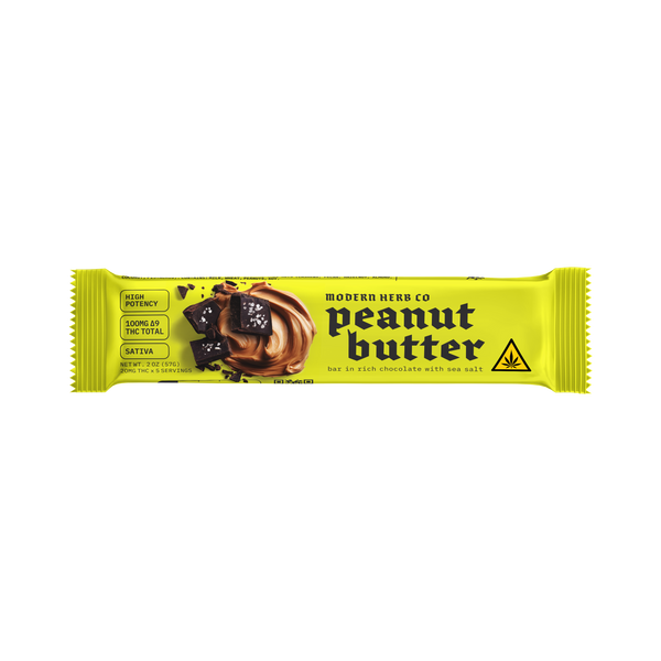 Dark chocolate salted peanut butter sativa bar by Modern Herb Co, showing a close-up of the chocolate bar with peanut pieces.