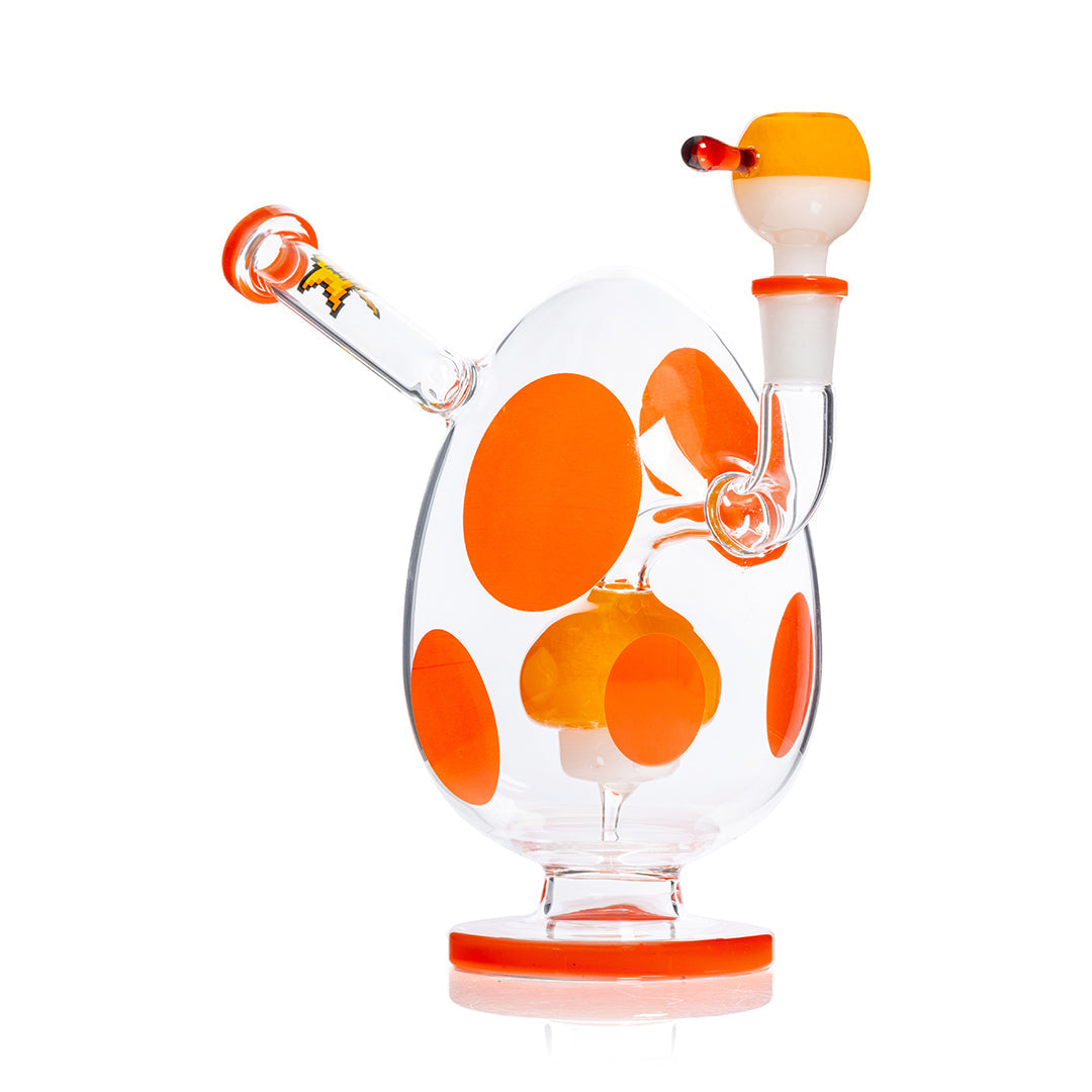 HEMPER Spotted Egg XL Bong, 9-inch orange glass waterpipe with spotted design, angled view on white background.
