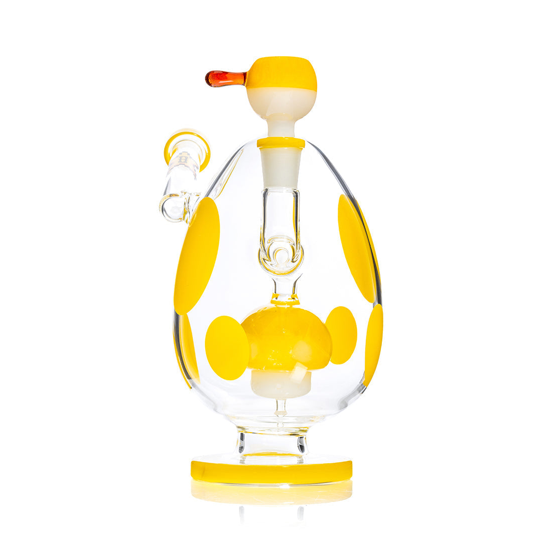 HEMPER Spotted Egg XL Bong 9-inch yellow waterpipe with black spots, clear glass accents, and a sturdy base.
