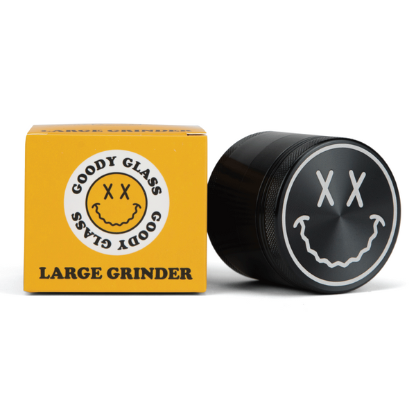 Goody Glass Big Face Grinder with colorful acrylic top and metal grinding teeth for efficient herb grinding.