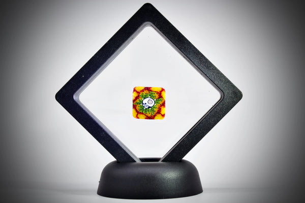 East Atlanta S&V AKM Glass honeycomb fire skull pipe maker with intricate design and vibrant colors.