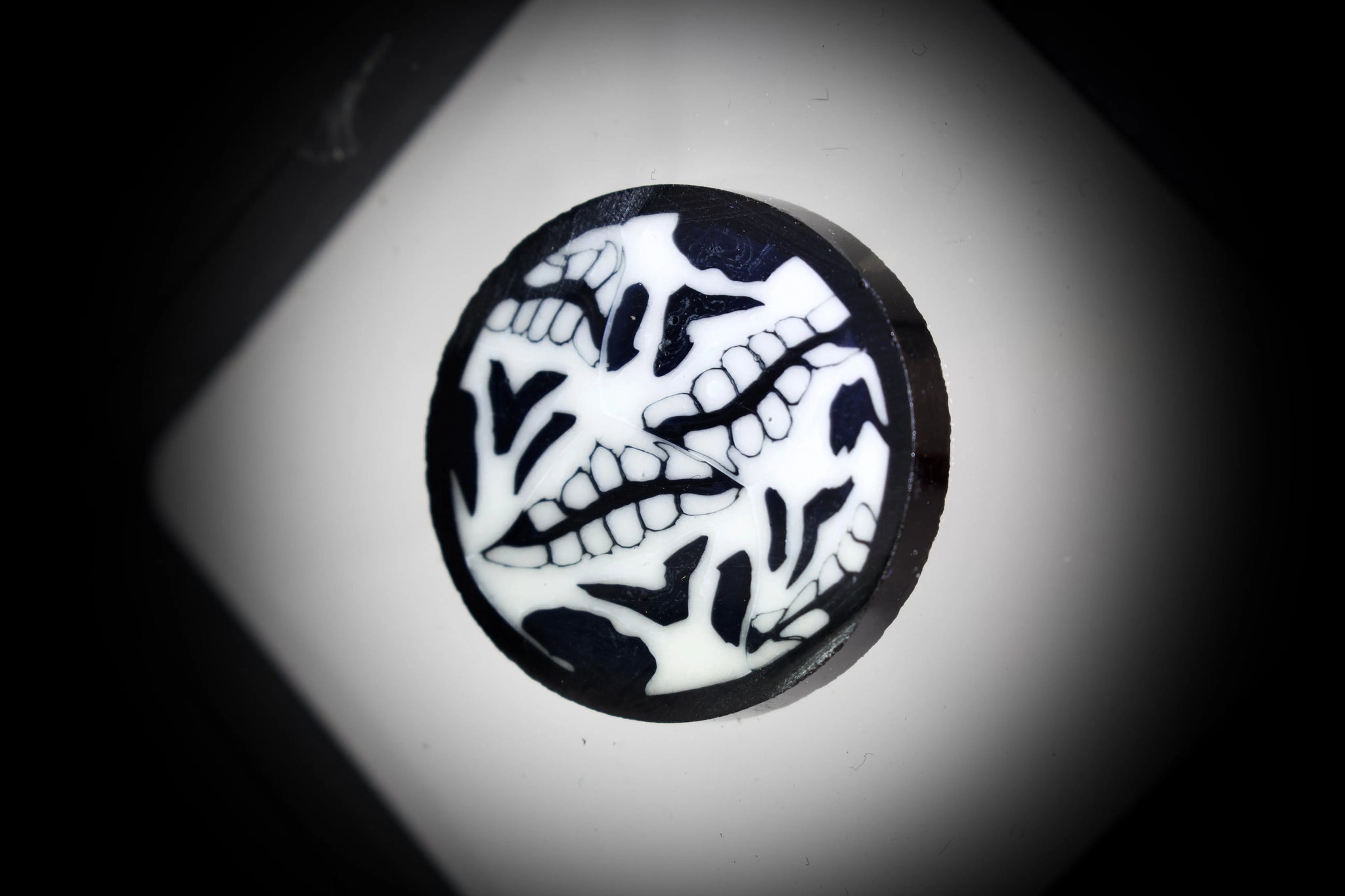 East Atlanta S&V AKM Glass Skullage Millie pipe maker with intricate skull design in vibrant colors.