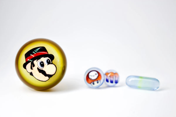 Micros Workshop UV Top Hat Super Mario Slurper Set 2022 by East Atlanta S&V, featuring colorful slurper and themed accessories.