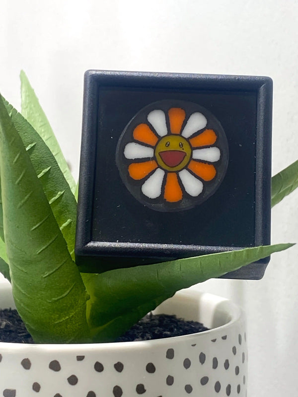 N8 X Elbo Murakami Slices glass accessories with colorful, artistic glass designs and intricate patterns.