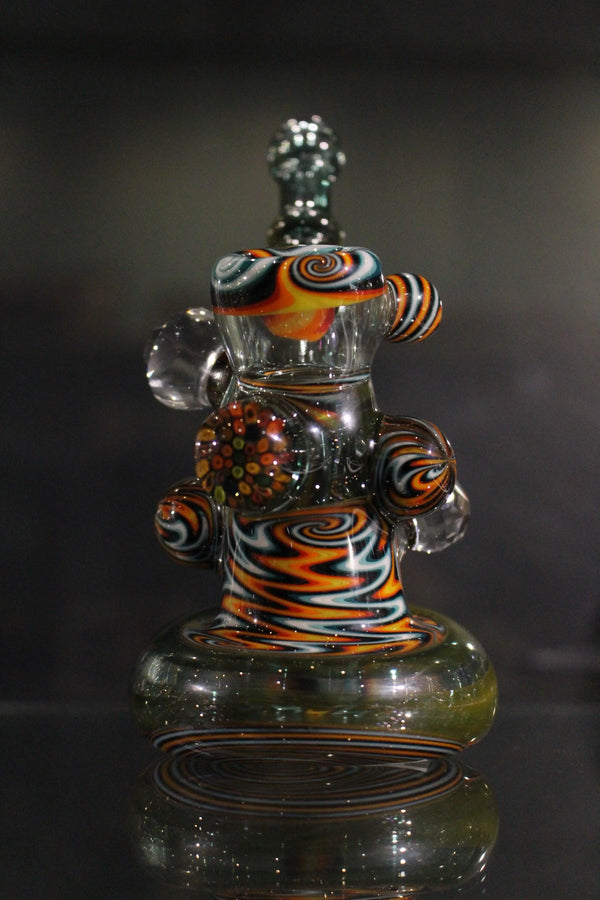 Oats Glass Push Bubbler, clear glass pipe with a compact design and mouthpiece for smooth smoking experiences.